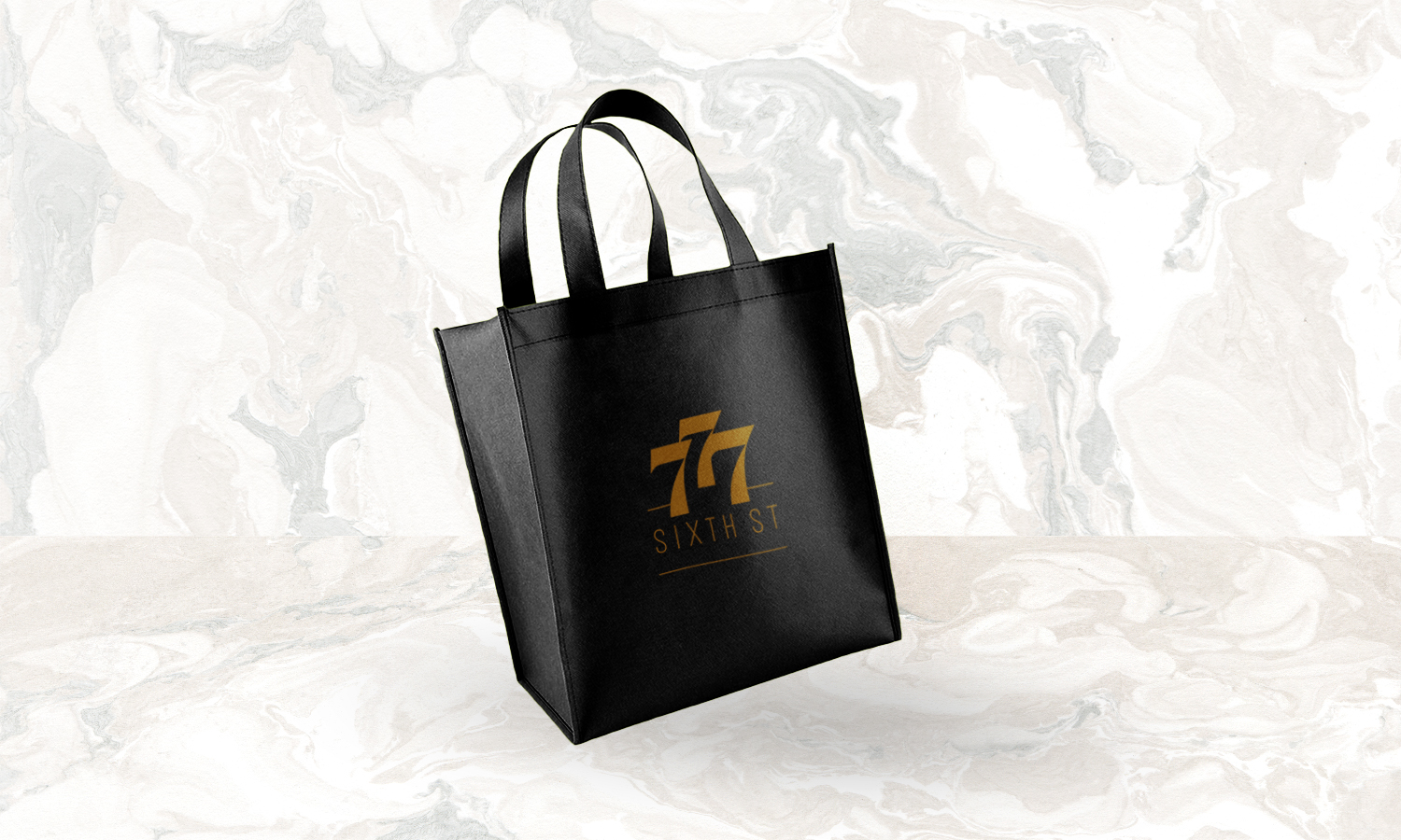 777 Sixth logo on event tote bag